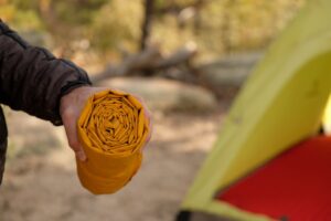 Tightly packed self inflating sleeping pad